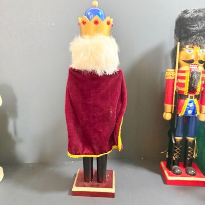 LOT 26: Collection of Wooden Nutcrackers with Other Holiday Decor - Including Santa of The World in Original Box & More