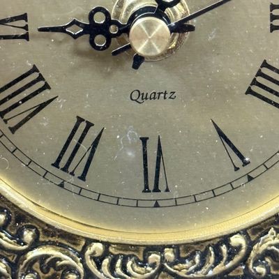 LOT: 72: Collection of Russian Style Nesting Dolls and Quartz Bombay Co Mantle Clock