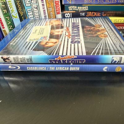 LOT 73: Samsung Blu-Ray Player BD-EM59C with a Large Selection of DVDs and 2 Blu-Rays - Including Unopened DVDs