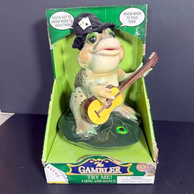 LOT 79: Vintage Dan Dee Animatronic Frog "The Gambler" in Original Box, Spidewick Childrens Book. Poker Chips, Cards and Hand...