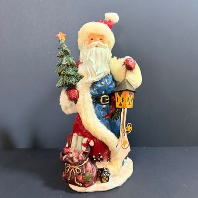 LOT 26: Collection of Wooden Nutcrackers with Other Holiday Decor - Including Santa of The World in Original Box & More