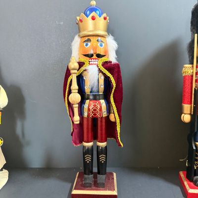 LOT 26: Collection of Wooden Nutcrackers with Other Holiday Decor - Including Santa of The World in Original Box & More