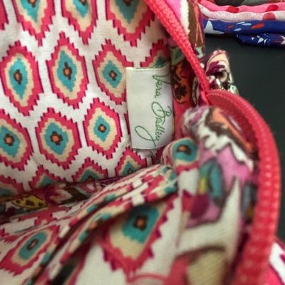 LOT 141: Vera Bradley Call Me Coral Small Crossbody, July Angel Accent Figurine, Zipper Pouches, Scarves & More
