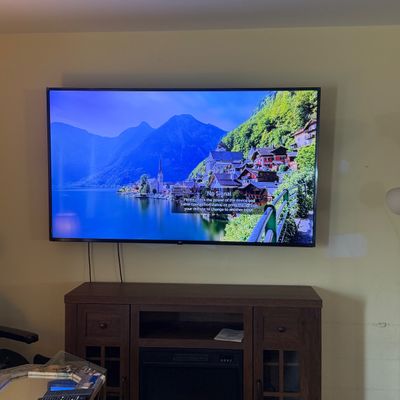 LOT 78: LG 70 TV with Remote