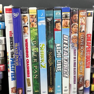 LOT 73: Samsung Blu-Ray Player BD-EM59C with a Large Selection of DVDs and 2 Blu-Rays - Including Unopened DVDs