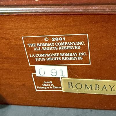 LOT: 72: Collection of Russian Style Nesting Dolls and Quartz Bombay Co Mantle Clock