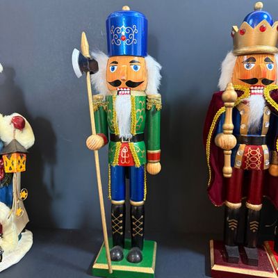 LOT 26: Collection of Wooden Nutcrackers with Other Holiday Decor - Including Santa of The World in Original Box & More