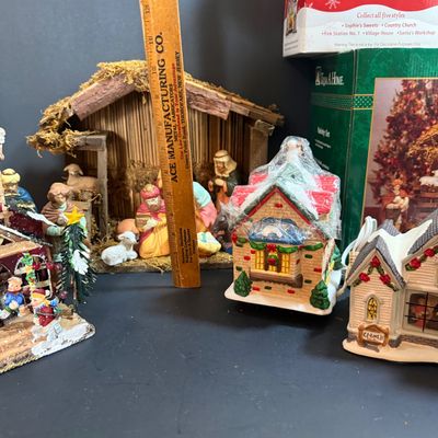 LOT 24: Holiday Novels by Mary Higgens Clark and John Grisham, Nativity Set In Original Box, Metal Church Candle Holder and More