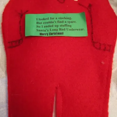 Sale Photo Thumbnail #18: Santa head, Santa face bag, sock made into long johns, 2 small Santa boots, Santa felt underwear, snowman bag, See pictures