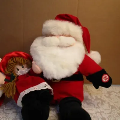 Sale Photo Thumbnail #29: 9" tall Laughing & peek-a-boo Santa takes 3 AA batteries included; 12" Santa with doll sings Jingle Bells & Santa Claus is Coming To Town & We Wish You a Merry Christmas and lights up, takes 2 AA batteries not included; both tested & they work, see pictur