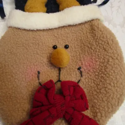 Sale Photo Thumbnail #17: Santa head, Santa face bag, sock made into long johns, 2 small Santa boots, Santa felt underwear, snowman bag, See pictures