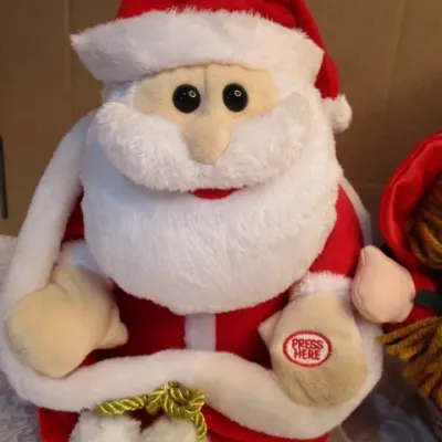 Sale Photo Thumbnail #28: 9" tall Laughing & peek-a-boo Santa takes 3 AA batteries included; 12" Santa with doll sings Jingle Bells & Santa Claus is Coming To Town & We Wish You a Merry Christmas and lights up, takes 2 AA batteries not included; both tested & they work, see pictur