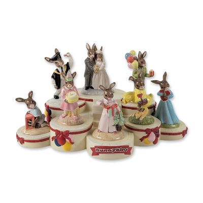 Sale Photo Thumbnail #435: 8pc Royal Doulton Bunnykins Occasions Collection Figurines and Stand