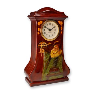 Sale Photo Thumbnail #240: Royal Doulton Kingsware Mantel Clock, The Alchemist