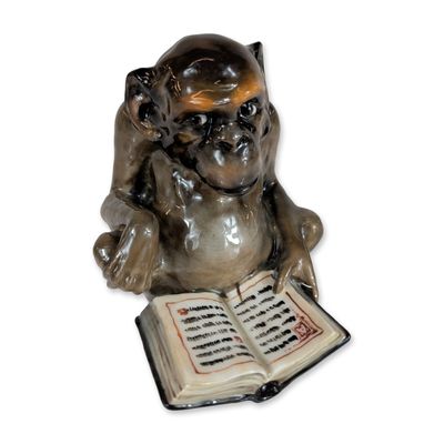Sale Photo Thumbnail #437: Royal Doulton Charles Noke Character Ape with Book Figurine HN960