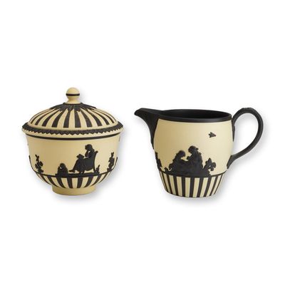 Sale Photo Thumbnail #318: A 2-Piece Wedgwood Primrose and Black Basalt Jasperware Lidded Sugar Bowl and Creamer