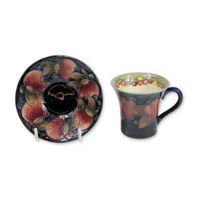 Sale Photo Thumbnail #77: Moorcroft Pomegranate Cup and Saucer Set