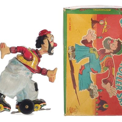 Sale Photo Thumbnail #414: TPS Mechanical Clown on Roller Skates Boxed