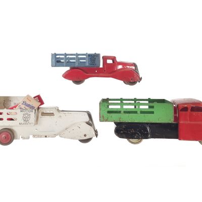 Sale Photo Thumbnail #299: (3) Marx Pressed Steel Stake Delivery Trucks