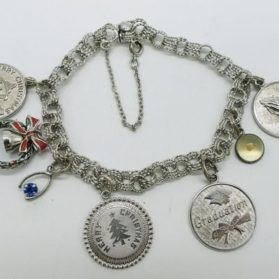 Sale Photo Thumbnail #162: Sterling Charm Bracelet, 7 Charms
