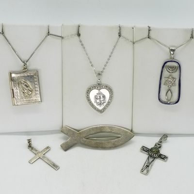 Sale Photo Thumbnail #331: Sterling Mixed Religious Pendants & More