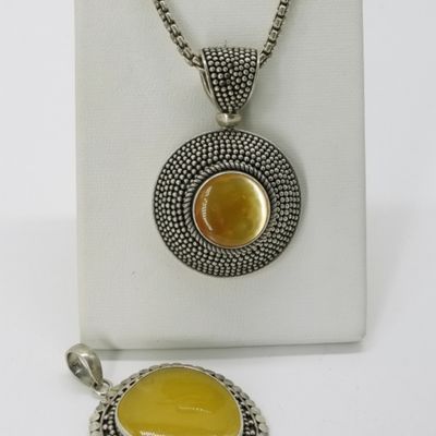 Sale Photo Thumbnail #381: Two Sterling Yellow Stone Pendants