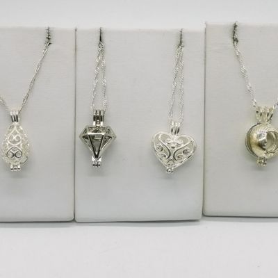 Sale Photo Thumbnail #334: 4 Sterling Scent Bead Pendants & Chains