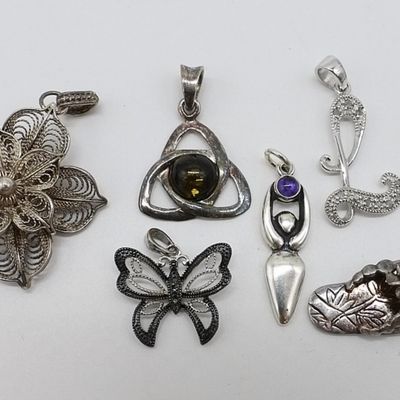 Sale Photo Thumbnail #256: Sterling Silver Pendant Lot, 7 Pieces