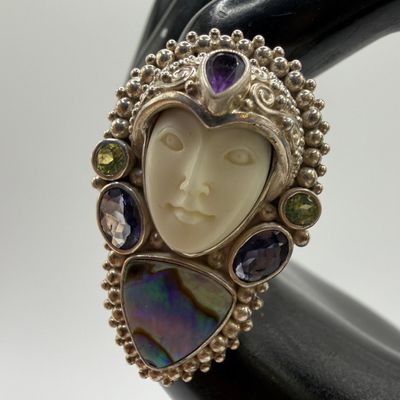 Sale Photo Thumbnail #1155: Carved Goddess Face Sajen Sterling Ring Abalone Shell Peridot Amethyst AB52