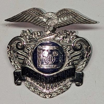 Sale Photo Thumbnail #1145: 1980s Disney World Female Security Hat Badge 254