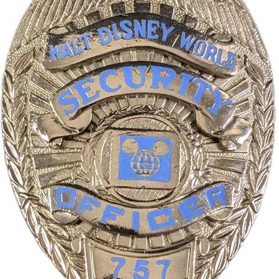 Sale Photo Thumbnail #1006: Early 1980s Disney World Security Metal Badge