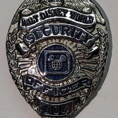 Sale Photo Thumbnail #1171: Early 1980s Disney World Female Security Badge 404