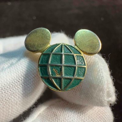Sale Photo Thumbnail #1046: Disney Cast Member Green Mickey Head Globe Icon Original Service Award Pin