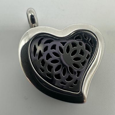 Sale Photo Thumbnail #1191: Aromatherapy Stainless Steel Open Silver Tone Heart Pendant