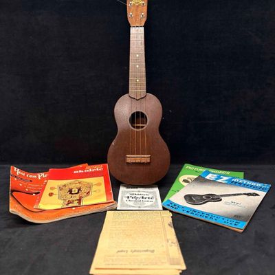 Sale Photo Thumbnail #1184: 1950s Favilla Mahogany Ukulele with 1940s to 1950s Published Ukulele Lessons