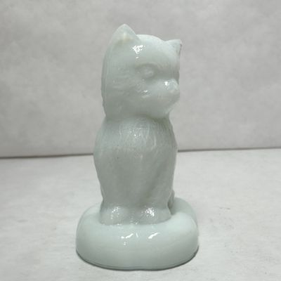 BOYD MILK SITTING KITTEN ON PILLOW