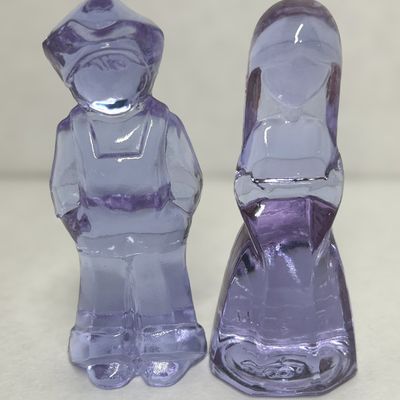 MOSSER PAIR OF LAVENDER GLASS JENNY AND JOSH
