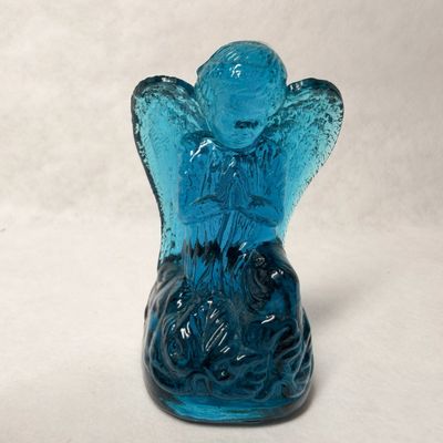 BOYD BLUE GLASS PRAYING ANGEL, LATE 20TH CENTURY