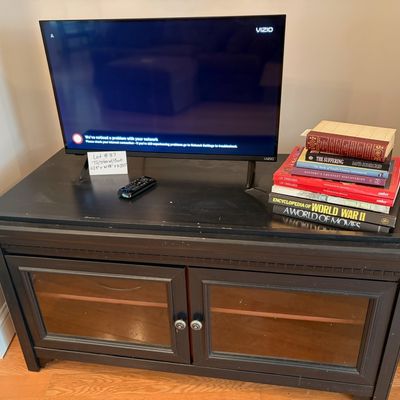 Sale Photo Thumbnail #60: Vizio TV / TV stand / Books