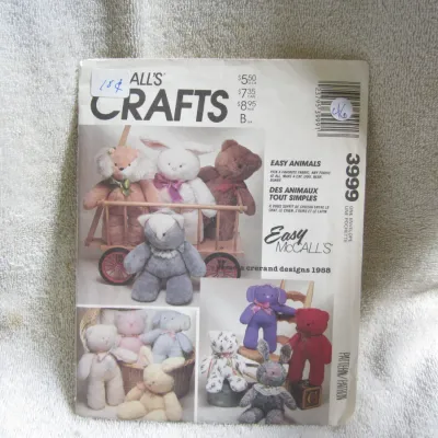 Sale Photo Thumbnail #47: Vintage 1988 McCall's Crafts sewing pattern number 3999 for 'Easy Animals' designed by Pamela Crerand. Features patterns and instructions to create stuffed toy animals including a cat, dog, bear, and bunny. The envelope shows some light wear, price sticke