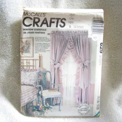 Sale Photo Thumbnail #42: Vintage McCall's Crafts sewing pattern number 629 for 'Window Essentials' (De Jolies Fenêtres). This package includes instructions and patterns for a variety of window treatments, including curtains, drapes, and valances. The envelope shows some wear, cr