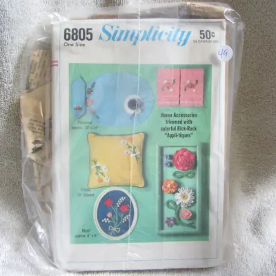Sale Photo Thumbnail #50: Vintage Simplicity sewing pattern number 6805 for home accessories trimmed with colorful Rick-Rack 'Appli-tiques'. Includes patterns for a placemat, pillow, motif, and other decorative items. One size. Envelope shows minor wear consistent with age, stored