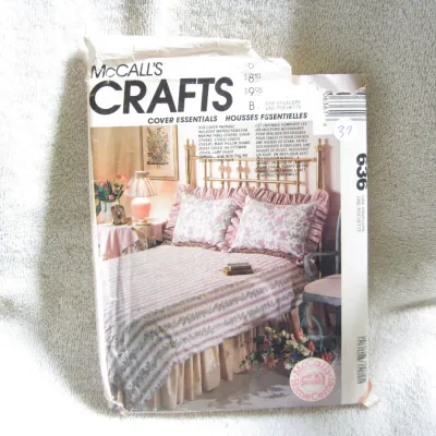 Sale Photo Thumbnail #38: Vintage McCall's Crafts sewing pattern #636, 'Cover Essentials'. Includes instructions for making table covers, chair covers, studio couch covers, pillow shams, duvet cover, ottoman cover, and lamp shade. The envelope shows some wear, creasing, and minor 