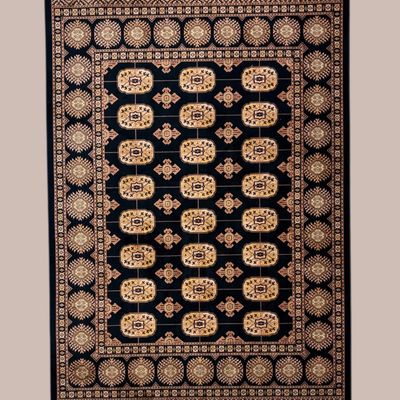 Deep teal and ivory rug featuring rows of repeating floral-style medallions framed by an ornate coordinating border.