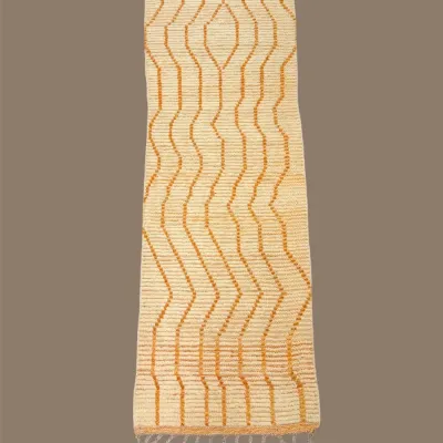 Neutral yellow and ivory runner featuring a clean contemporary wavy pattern. A simple statement piece for a hallway or narrow space.