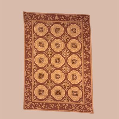 Blue and gold traditional rug featuring dense floral detailing and an elegant all-over pattern in soft complementary tones.
