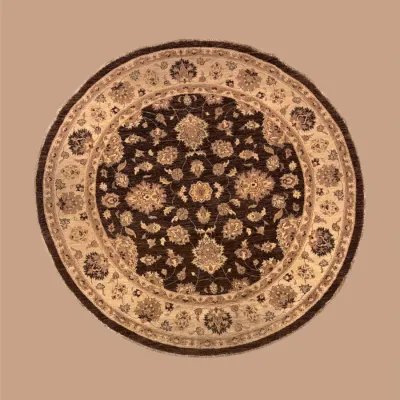 Round black, ivory, and gold rug featuring a dramatic floral medallion surrounded by elegant traditional detailing.