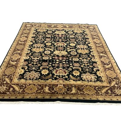 Black and gold floral designed rug with beautiful details and burgundy accents.