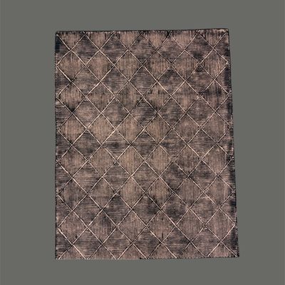 Soft blue and gray rug featuring a subtle repeating diamond pattern and gently distressed appearance for a relaxed contemporary or...