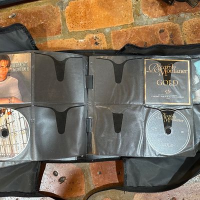 Huge CD Collection – 4 Large Binders – Hundreds of Country, Pop & Rock Albums